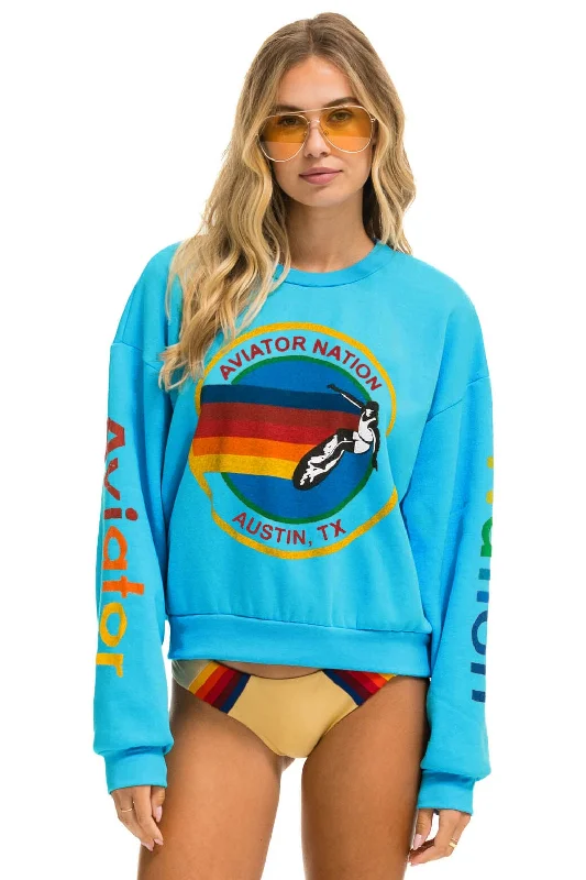 AVIATOR NATION AUSTIN RELAXED CREW SWEATSHIRT - NEON BLUE Hoodie with Hem Fringe Bohemian Relaxed AVIATOR NATION AUSTIN RELAXED CREW SWEATSHIRT - NEON BLUE Hoodie with Hem Fringe Bohemian Relaxed