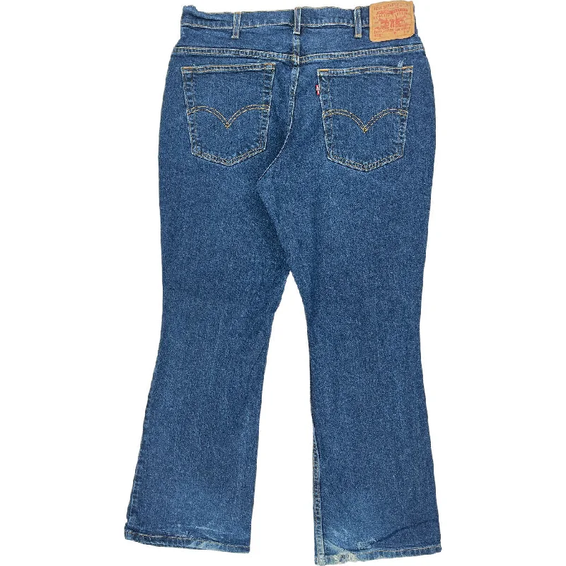Levis 515 Boot Cut Jeans - 34W 30L - Blue Cotton Blend Fashionable Raw Edge Jeans